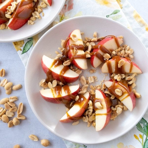 Manzana con cacahuate y cajeta de 164 Kcal