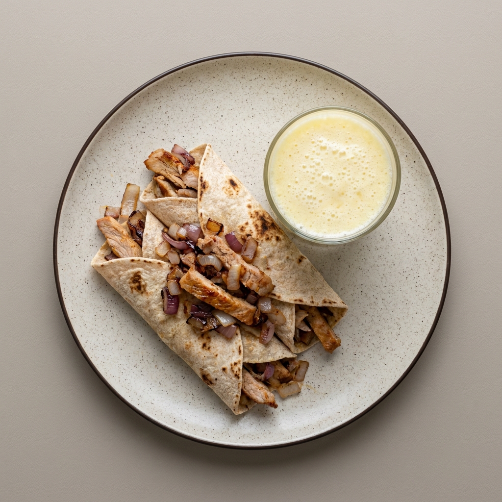 Tacos árabes de cerdo y licuado de piña