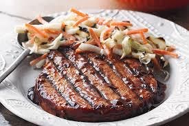 Chuleta con ensalada de col